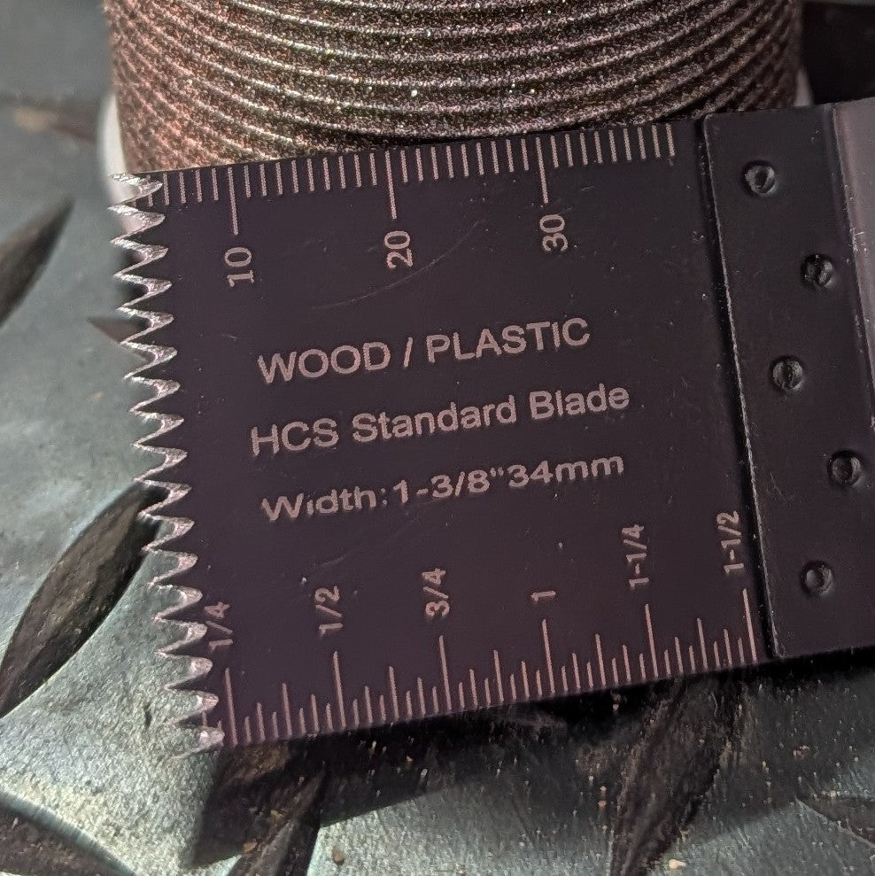 Detailed view of restored cutting teeth on a resharpened multi-tool blade