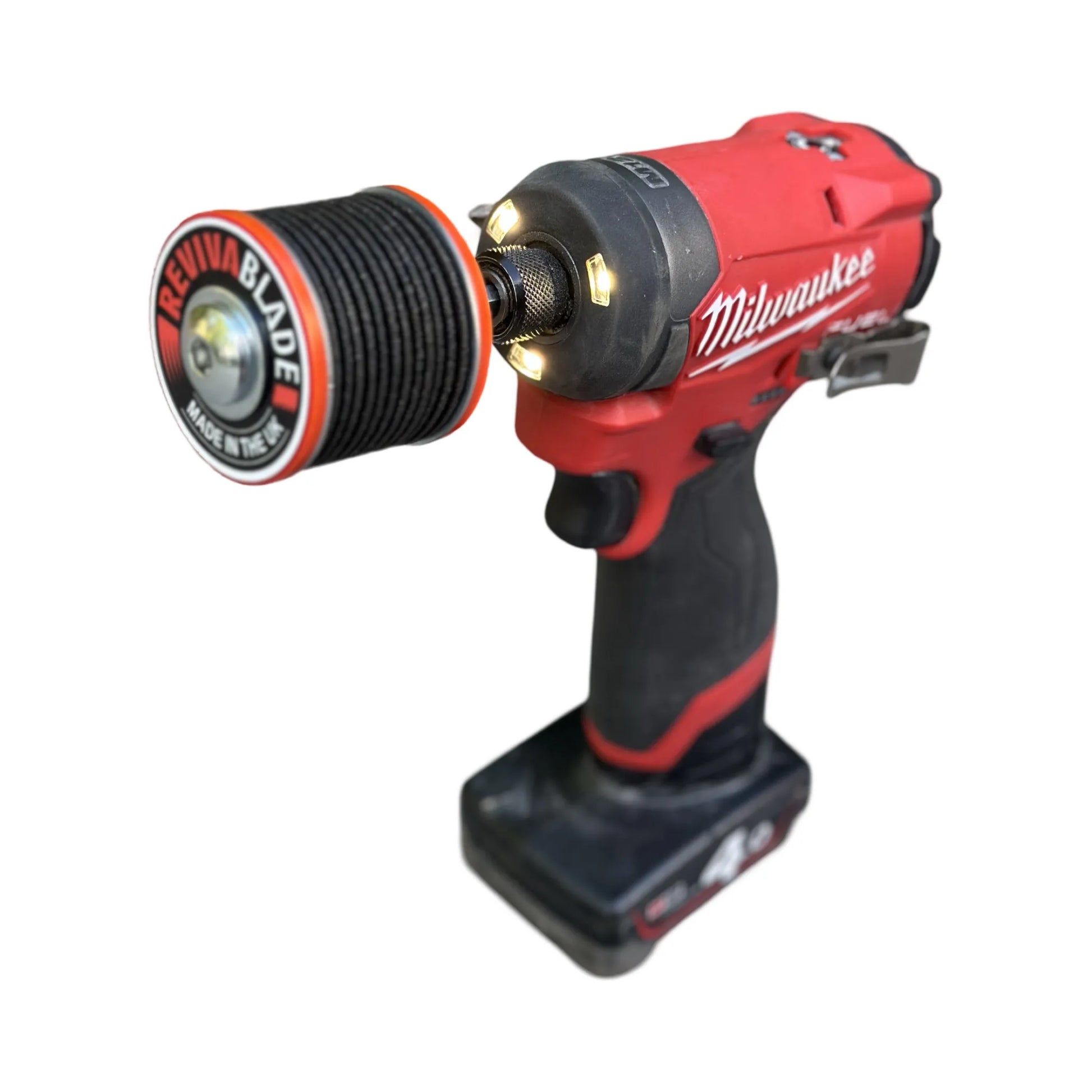 Red and black Milwaukee power drill on a white background