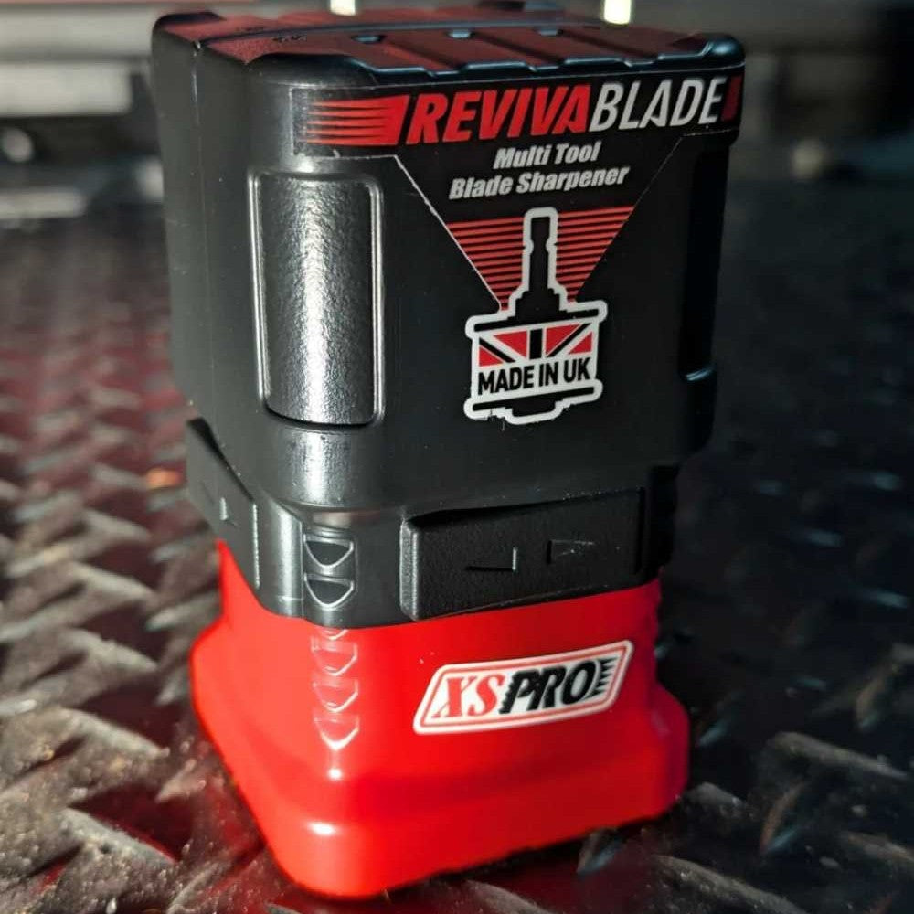 Revivablade multi-tool blade sharpener with 'XS Pro' branding on a storage container